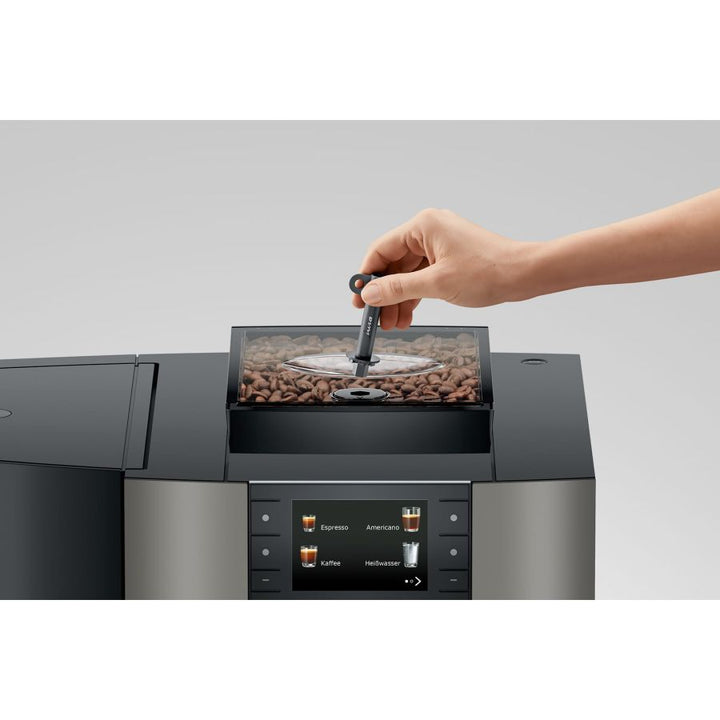 Jura X4c kahviautomaatin papusäiliön lukitus ylhäältä